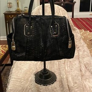 B. Maksowski black metallic satchel. EUC